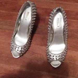 Spiked open yoe heels